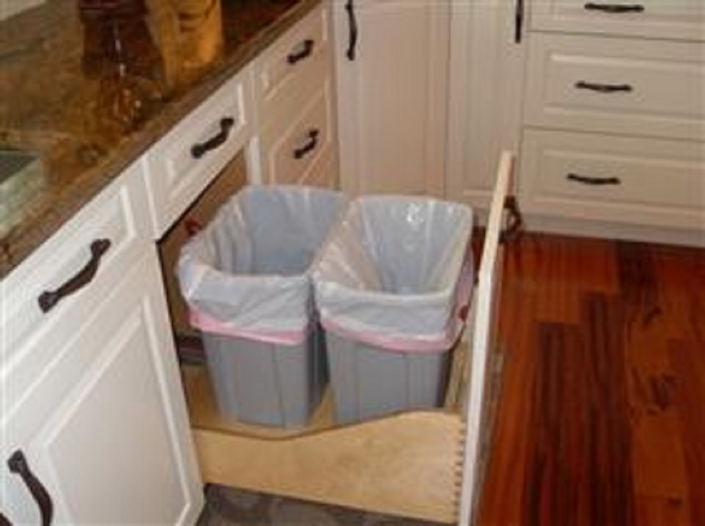 2 trash bins in the kitchen
