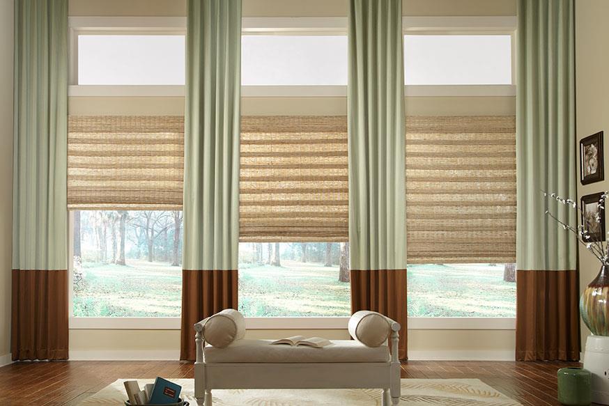 canvas textured blinds and green-brown large curtains in the side