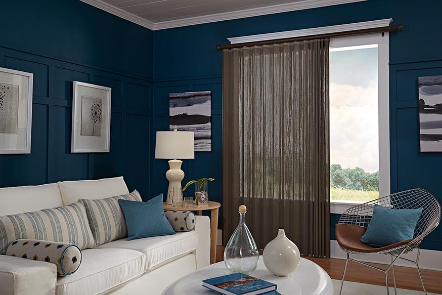see through dark green curtain in living area